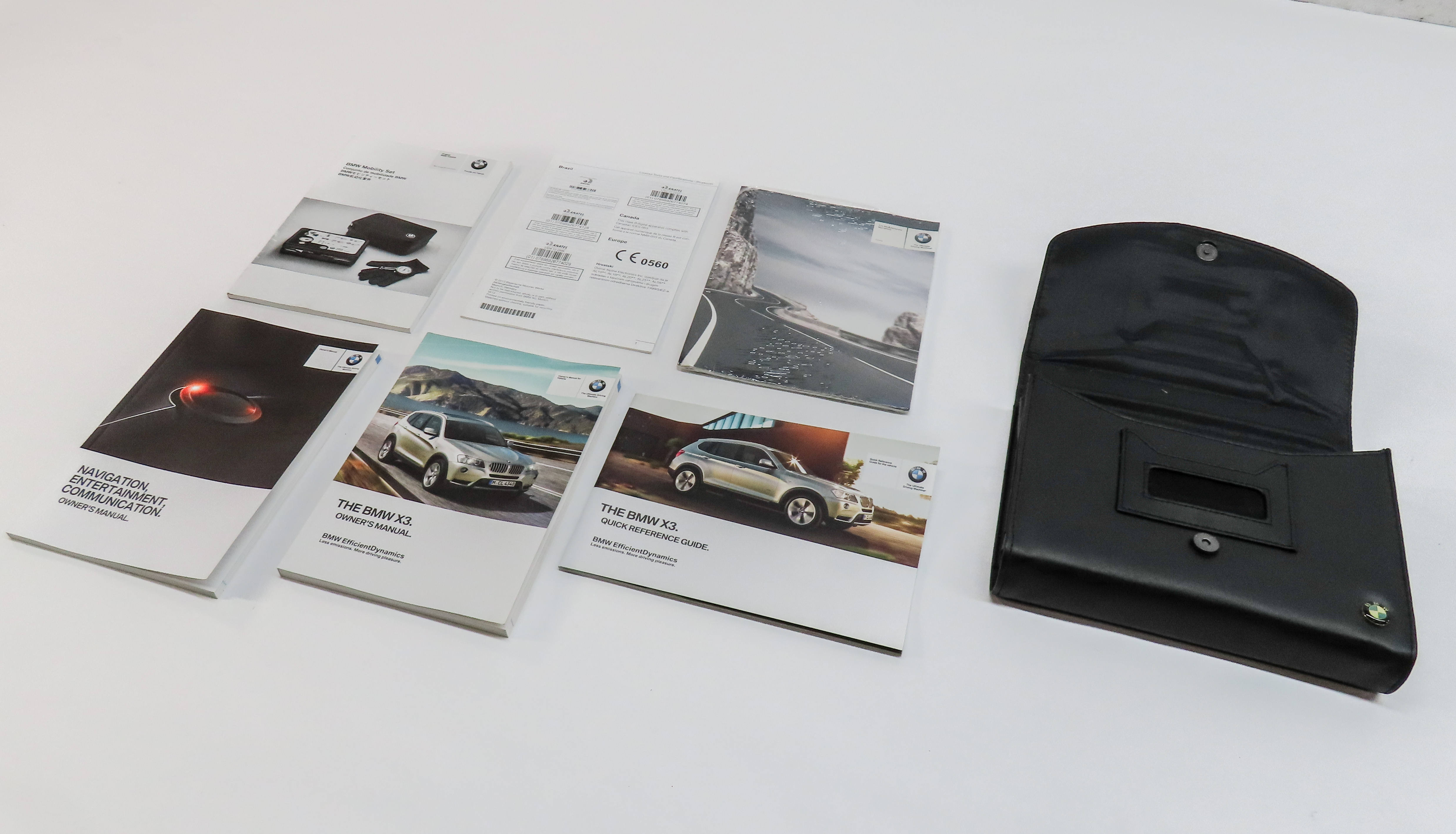 2014 BMW X3 (F25) OWNERS MANUAL BOOK READING LITERATURE BOOKLET GUIDE SET & CASE — exact item pictured